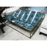 LOW TABLE, of vast proportions with marble top on square brass support frame,