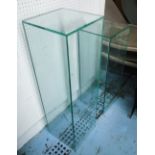 GLASS PLINTHS, two, one 30cm W x 30cm D x 100cm H, the other 30cm W x 30cm D x 82cm H.