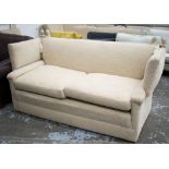 KNOLE SOFA, cream chenille upholstered with traditional drop down sides and two seat cushions,