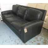 SOFA, three seater in black leather on block supports, 210cm L.