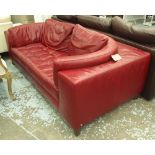 NATUZZI 'OSAKA' SOFA, with wine coloured leather upholstery, 200cm L x 70cm H.