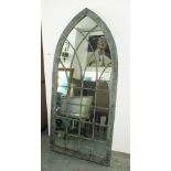 ORANGERY MIRROR, in a Gothic style, with a distressed effect metal frame, 162cm x 74cm.