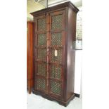 TAKAT CABINET, hardwood with metal grill doors, 51cm D x 216cm H x 115cm W.