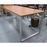 CONRAN DESK / TABLE, with a rectangular wooden top on metal supports, 180.5cm L x 74cm H x 80cm D.