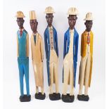 'COLON' FIGURES, five various, West African, carved and painted wood, tallest 61.5cm H.