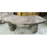 GARDEN BENCH, curved weathered reconstituted stone raised upon lion supports,