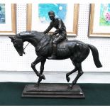 BRONZE STATUE, jockey on a horse, 68cm L.