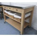 EDDINGTONS KITCHEN TROLLEY, beech with a rectangular metal top over three short drawers,