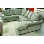 CORNER SOFA, from Sofa Workshop, of curved form, green upholstery, costs £4600 new,