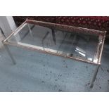 LOW TABLE, the glass top with a mirrored border on a polished metal bamboo inspired base,