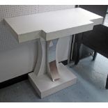 CONSOLE TABLE, white, of breakfront outline with curved polished metal supports,