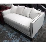 SOFA, two seater, with studded cream upholstery and four matching scatter cushions, 161cm L.