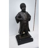 BRONZE STATUE, a Russian man on a marble base, 46cm H.