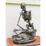 BRONZE STATUE, seated skeleton, 51cm H.