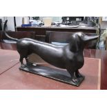 BRONZE STATUE, a dog, 45cm L.