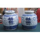 GINGER JARS, a pair, Chinese style blue and white glaze, 22cm H.