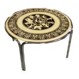 LOW TABLE, 1970s circular Classical black and white decorated raised on chrome supports,