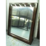 WALL MIRROR, the mahogany frame enclosing a glazed plate, 102cm x 125cm H.