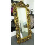 CHEVAL MIRROR, Rococo style, bevelled plate in an ornate gilded frame, 191cm x 89cm.