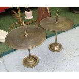 SIDE TABLES, a pair, circular bronze effect with carrying handles, 49cm diam. x 65cm.