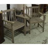 GARDEN ARMCHAIRS BENCH, weathered slatted teak two armchairs with conjoining table and parasol,