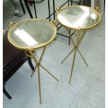 OCCASIONAL TABLES, a pair, circular with mirrored tops on brass effect tripod supports,