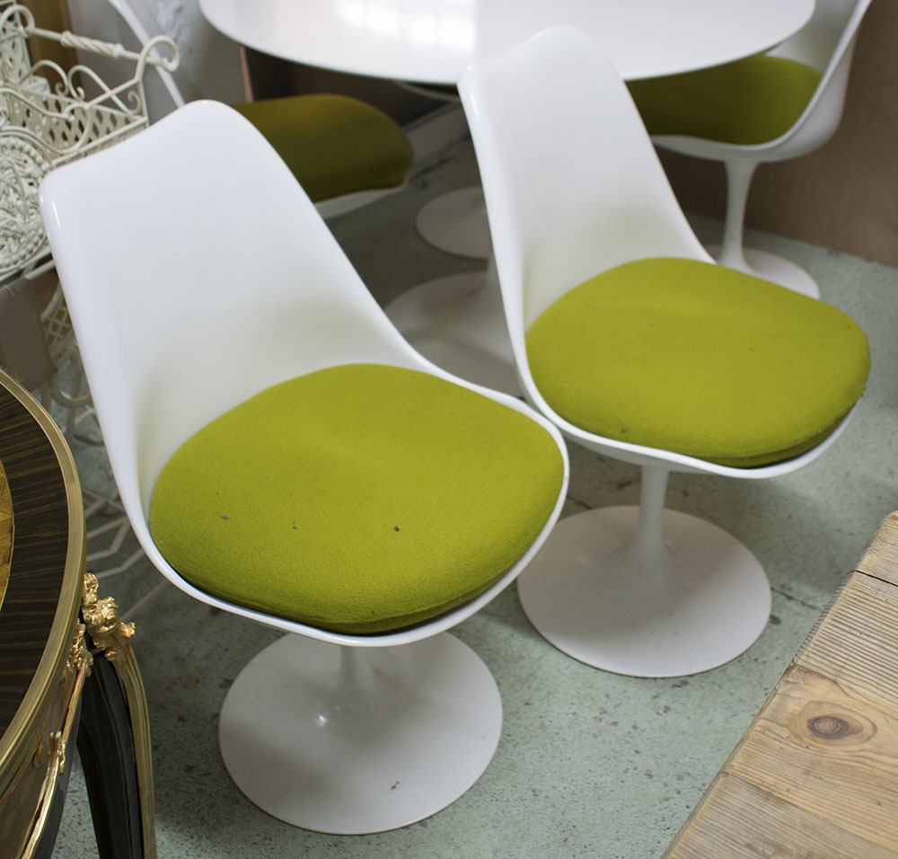 TULIP CHAIRS, a set of five, in white with green padded seats, on metal supports, 50cm W x 46cm D,