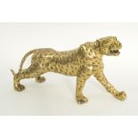 STUDY OF A LEOPARD, gilt metal, 26cm nose to tail.