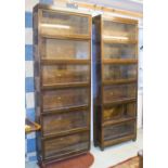 GLOBE WERNICKE BOOKCASES, a pair, mid 20th century oak, each six tier, one glass front missing,