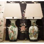 LAMPS, a pair, ceramic Chinoiserie decorated with figures on pierced wood supports,
