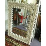 WALL MIRROR, Indian carved hardwood in a cream painted finish, 93cm x 126cm H.