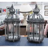 STORM CANDLE LANTERNS, a pair, Georgian design, with crown tops, glass lined metal frames,