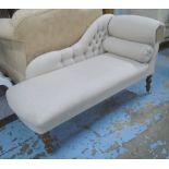 CHAISE LONGUE, in neutral buttoned fabric on turned castor support, 137cm.