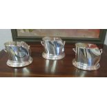 WINE COOLERS, a set of three, silver plated, 25cm W x 20cm H.