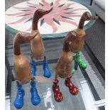 WOODEN RUNNER DUCKS, a set of four, retro art design in carved solid wood with polished finish,