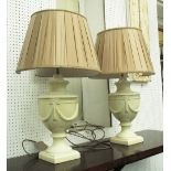TABLE LAMPS, a pair, urn shaped in cream crackle glazed finish, 52cm H.