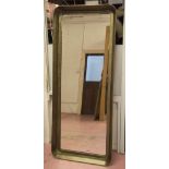 BRONZE WALL MIRROR, with a rectangular rounded cushioned frame, 61cm W x 148cm H.