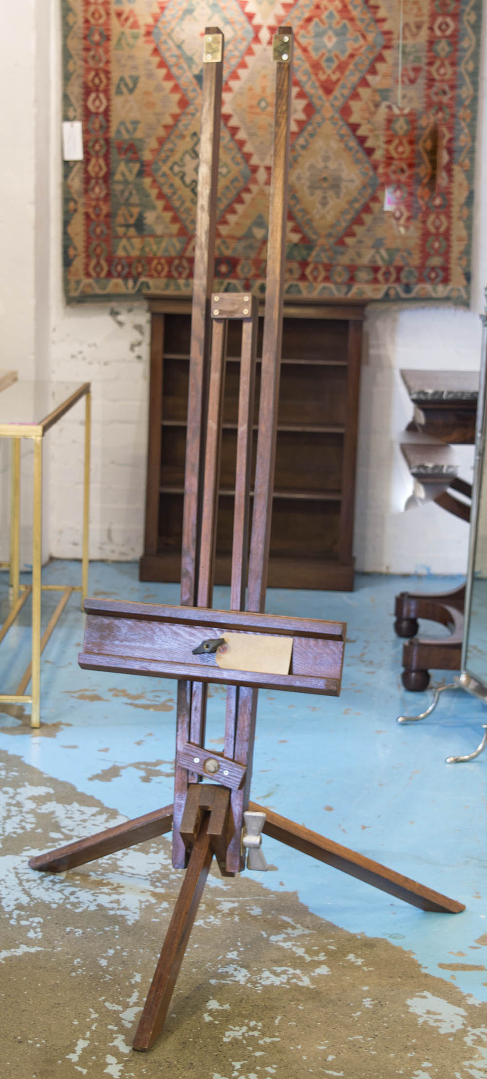 ARTISTS EASEL, 20th century polished wood and adjustable, approx. 190cm H.