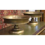 BRONZE CENTREPIECE BOWLS, a pair, each with a circular dished top, 50cm diam x 25cm H.