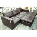CORNER SOFA AND OTTOMAN, in burnt umber leather on block supports, 247cm x 169cm,