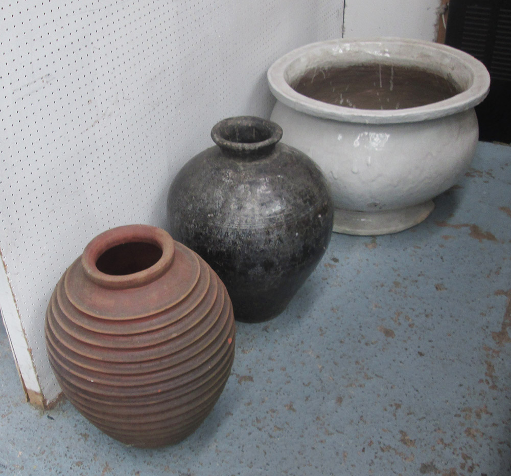 GARDEN POTS, three various, largest in cream glass 62cm diam x 45cm H with faults,