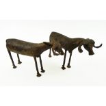 LOBI BRONZE RAM SCULPTURES, a companion pair, cast concentric circle decoration, Burkino Faso,