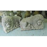 RECUMBENT LIONS, a pair, in stone, 81cm L.