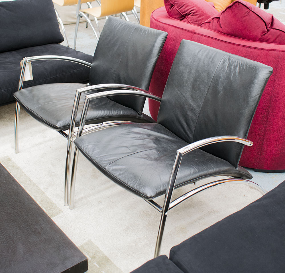 KEBE 'SIT' CHAIRS, 2001, a pair, in black leather on a chromed metal frame, 65cm W.