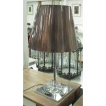 TABLE LAMP, on chromed metal base with a white shade, 71cm H.