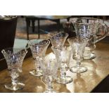 LEMONADE/PIMMS SET, a set of acid etched six glass and jug with ball stems and wide bases.