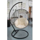 SUSPENDED GARDEN SEAT, ball shaped, with cushion, suspended in a metal, wicker covered frame,