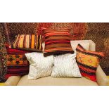 VINTAGE KILIM CUSHIONS, a set of four, together with two silk ikat cushions.