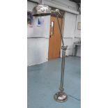 FLOOR STANDING READING LIGHT, by the Kings, articulated, in chromed metal finish, 160cm H.