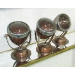 WALL LIGHTS, a set of three, in the style of Vespa motorcycle head lamps,